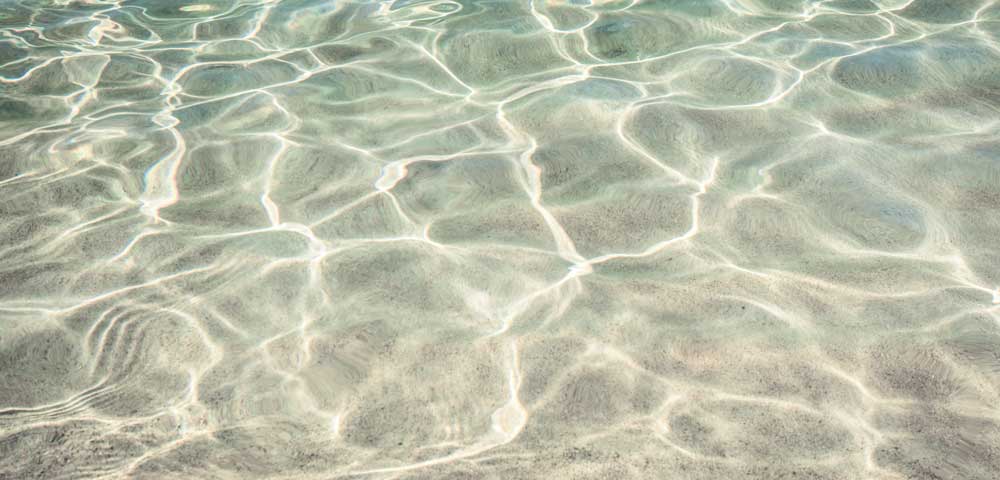 Finiture ed effetti - trasparente Acqua limpida - spiaggia con sabbia